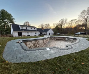 A finished masonry project around an inground pool