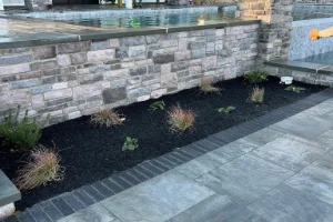 Hardscape work featuring stone and brick by a masonry contractor in Chester Springs, PA