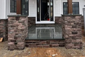 Hardscape work featuring stone and brick by a masonry contractor in Coatesville, PA